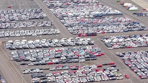Large-scale car storage lot with rows of vehicles Stock Footage 331548041