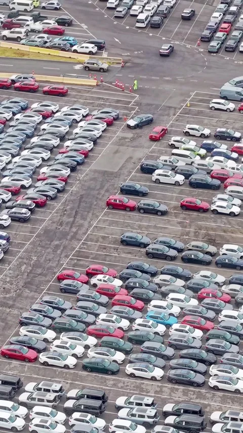 Large-scale car storage lot with rows of vehicles Stock Footage 332778212