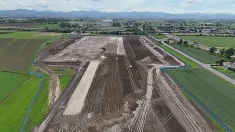 Large-scale data center and logistics hub construction in Po Valley Italy Stock Footage 337933090
