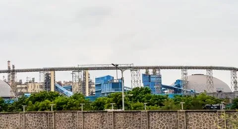 Large Scale Industrial Complex with Elevated Conveyor Belt and Utility Infr.. Stock Photos