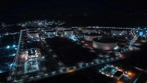 Large Scale Petroleum Storage Facility Illuminated At Night In Si Racha Cho.. Stock Photos