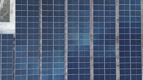 Large-scale photovoltaic array transforming sunlight into sustainable elect.. Video stock 335192865