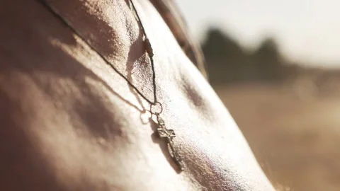 A large-scale plan of a man's body with a cross on his neck Stock-Footage 138167863