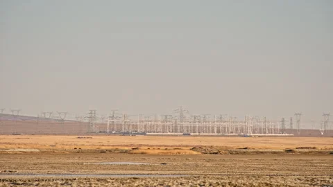 Large scale power transmission structures in Gobi desert Stockbeeldmateriaal 326236194