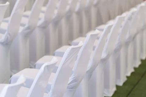 Large scale seating setup with many chairs prepared for an audience in a bi.. Photos