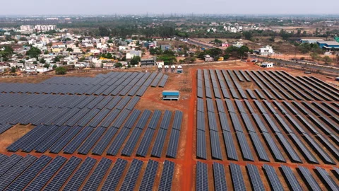 Large Scale Solar Panel Farm Near Urban Area in India Aerial View Stock Footage 334960940