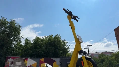 Large scooter handlebar, blue sky with clouds. Moscow, Russia. 24/07/2025 Stock Footage 313665172
