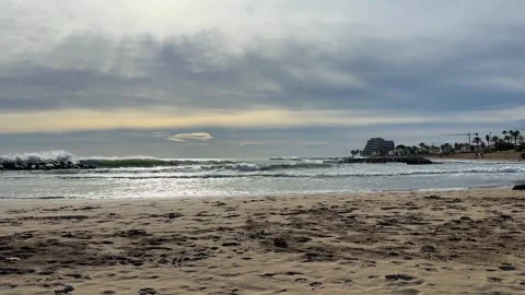 Large sea waves breaking on rocky shore Stock Footage 328171153