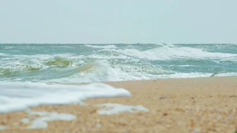 Large Sea Waves Drive to the Beach in Sunny Weather Stock Footage 94839914
