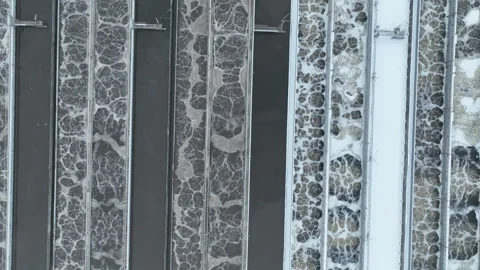 Large sedimentation basins allow wastewater to settle Video stock 327796714