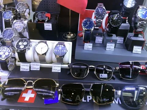 Large selection of assorted watches and costume.jewelry. Stock Photos
