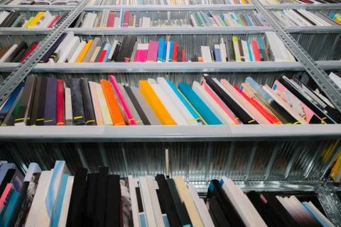 Large selection of books in the public library. Research Stock Photos