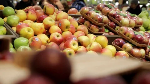 Large selection of fresh apples at the grocery market. Stock Footage 128239909