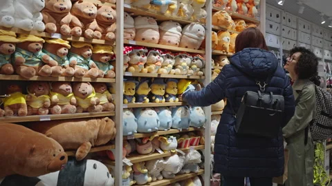Large selection of soft toys on store shelves. Minsk, Belarus, 2023 Stock Footage 240134659