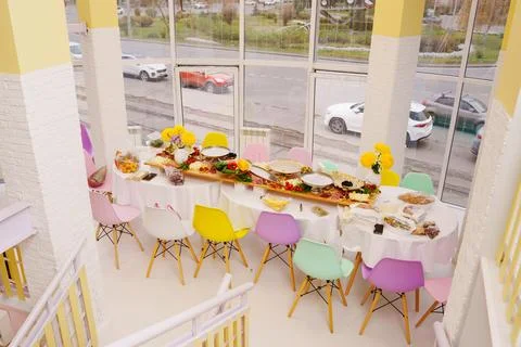 A large served table with salads, vegetables and barbecue, treats and snacks Stock Photos
