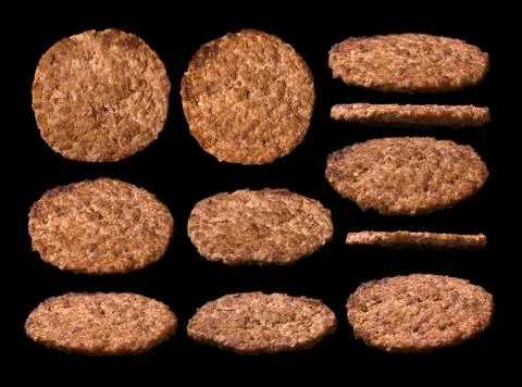 Large set of burger cutlets isolated on black Stock Photos