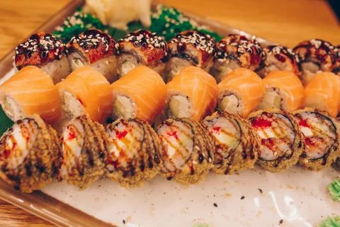 Large set of Sushi Rolls Warm Ebi Sake Unagi Spring. Assortment Philadelphia  Stock Photos