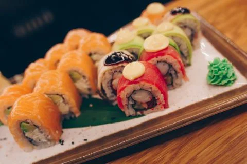 Large set of Sushi Rolls Warm Ebi Sake Unagi Spring. Assortment Philadelphia  Stock Photos