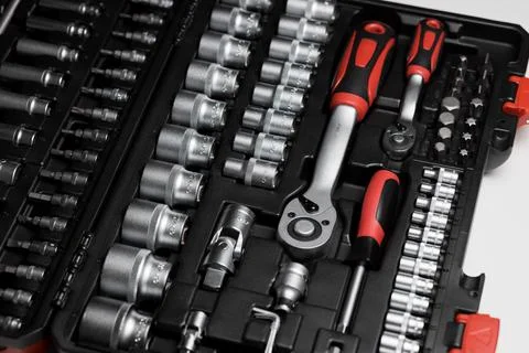 A large set of tools in a black box close-up. Nozzles of different sizes Stock Photos