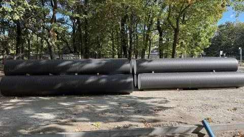 Large sewer pipes, repairs, replacement of sewer pipes on heating mains. Stock Photos