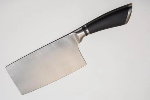 Large sharp cleaver knife with black plactics handles On White background. Stock Photos