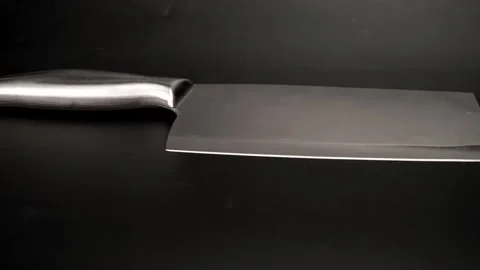 Large sharp knife with stainless steel handle isolated on black background. Stock-Footage 248272838