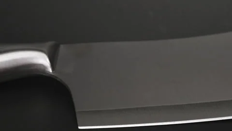 Large sharp knife with stainless steel handle isolated on black background. Stock-Footage 248272839