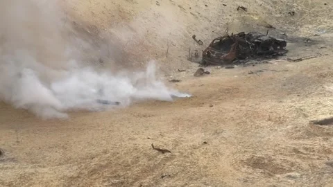 A large shell explodes at the training ground. Stock-Footage 307167206