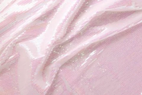 Large shiny glossy white sequins background. Stock Photos
