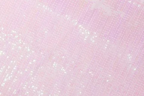 Large shiny glossy white sequins background. Stock Photos
