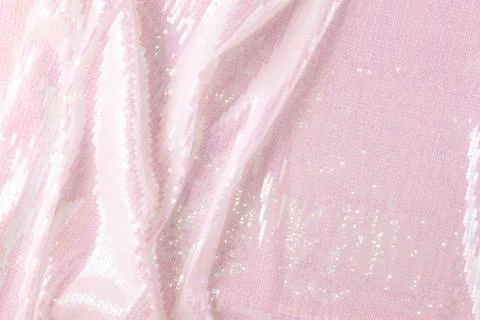 Large shiny glossy white sequins background. Stock Photos