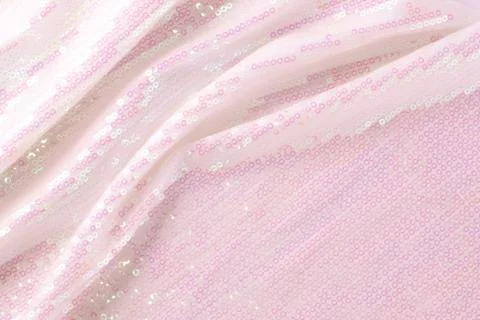 Large shiny glossy white sequins background. Stock Photos
