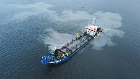 Large ship cargo cleans the seabed with special equipment in seaport Video stock 142373493