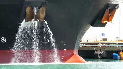 Large ship dump ballast water 4k Stock Footage 89941350