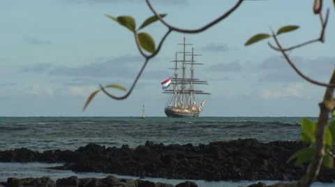 A large ship lying at anchor near the coast. Stock Footage 39482128