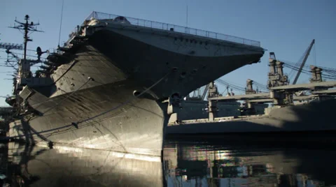 Large ship resting in the Harbor USS Hornet Naval Ship Yard US Navy Battle Ship  Stock Footage 35437488