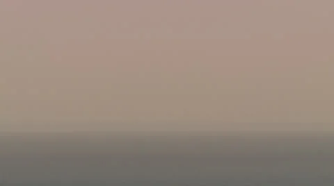 A large ship sailing into the view of the camera. Longshot. Stock Footage 39483426