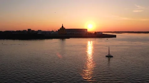 A large ship at sunset is moving at the confluence of two rivers Stock Footage 164425227
