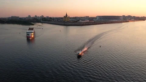 A large ship at sunset is moving at the confluence of two rivers Видео 164425232