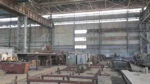 A large shipyard or steel structure factory from the inside. Huge workshop for Видео 319192332