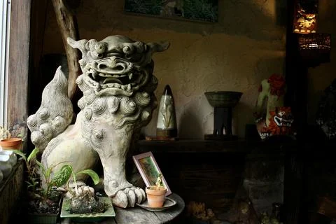 Large Shisa Statue Inside House. Stock Photos