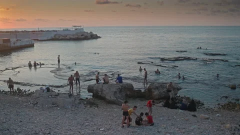 Large shot, people at Beirut beach Stock Footage 159615341