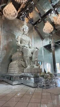 Large Silver Buddha Statue in Reflective Crystal Hall of a Thai Temple Stock Photos