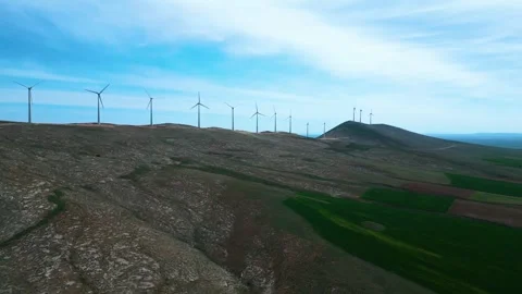 A large sinkhole, lake and wind turbines Stock-Footage 274847828