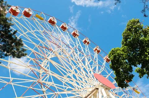 Large size Ferris wheel, bottom-up view. June 2019, Minsk. Belarus. Stock Photos