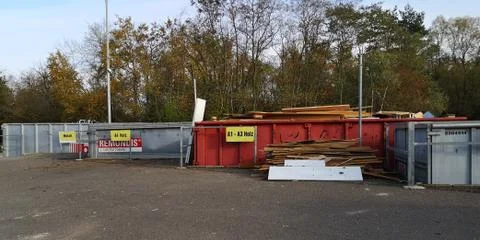 Large-size garbage collection station in Germany.Waste containers for old things Stock Photos