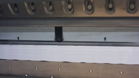 Large size stack of paper in a machine in a print house Video stock 120571863