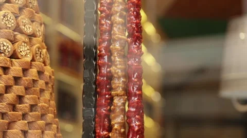 Large-sized Turkish sweets called Sujuk are available at a candy store Stock Footage 320067731