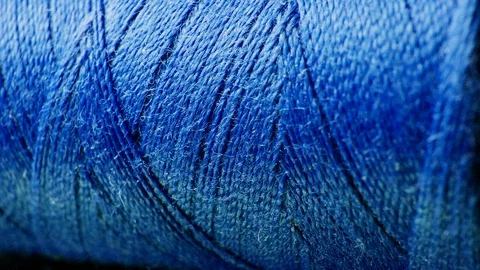 A large skein of thread at a sewing factory in the process of sewing clothes Stock Footage 123232373