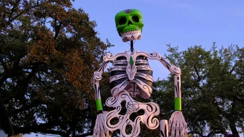 Large skeleton dancing outdoors at Dia de Los Muertos Stock Footage 141898329